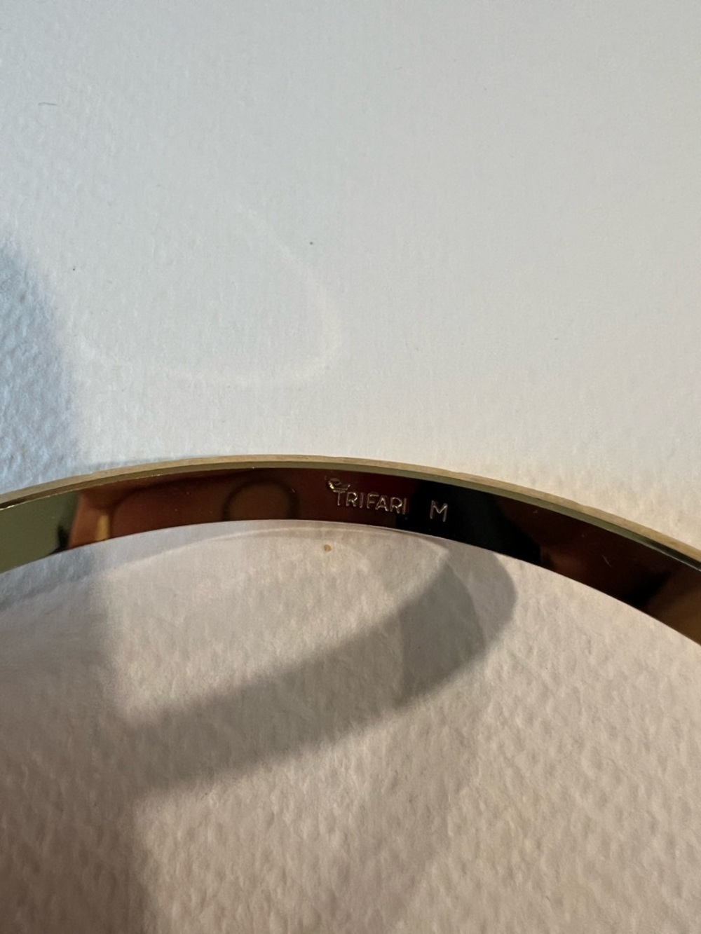 Trifari Gold-Tone Textured Crescent Bangle Bracelet - Picture 4 of 4